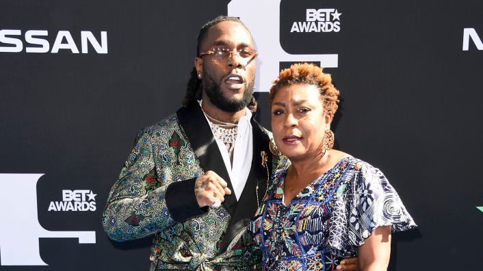 Burna Boy Brings Out Mum To Perform “Dangote” Live On Stage