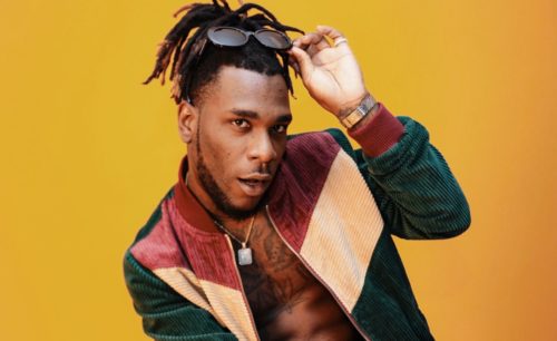 Burna Boy Shares Rare Picture Of Himself & His Dad Having Intimate Conversation