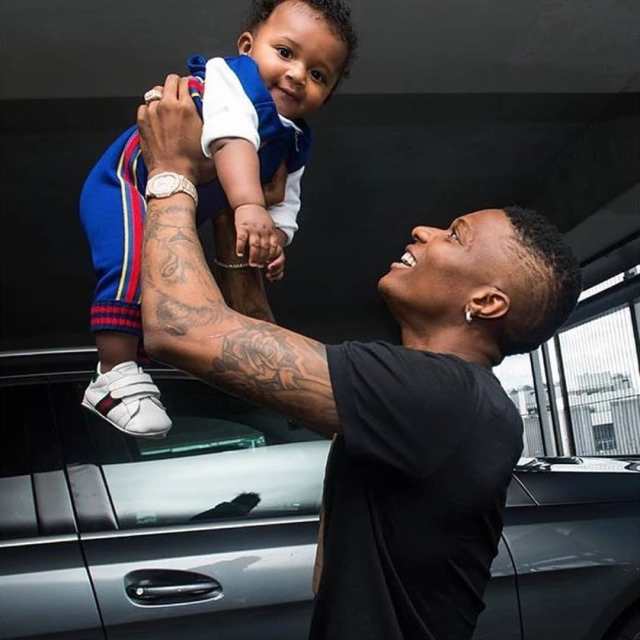 Wizkid Reacts After Being Called “Humble” For Eating Pounded Yam With His Son, Zion